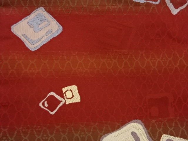  色紙散らし模様織出し名古屋帯